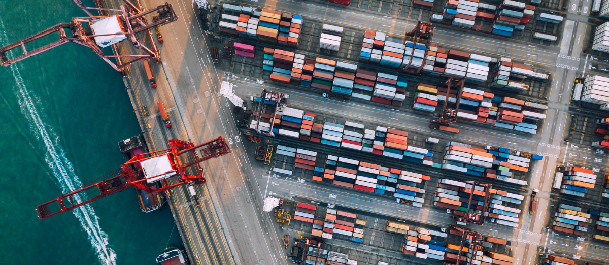 Drone view of shipping containers and cranes