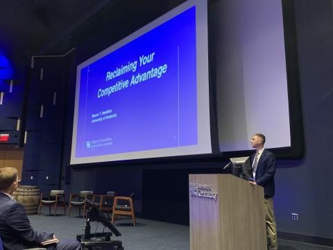 Graduate Student Mason Hamilton presenting "Reclaiming Your Competitive Advantage" at the James B. Beam Institute Industry Conference